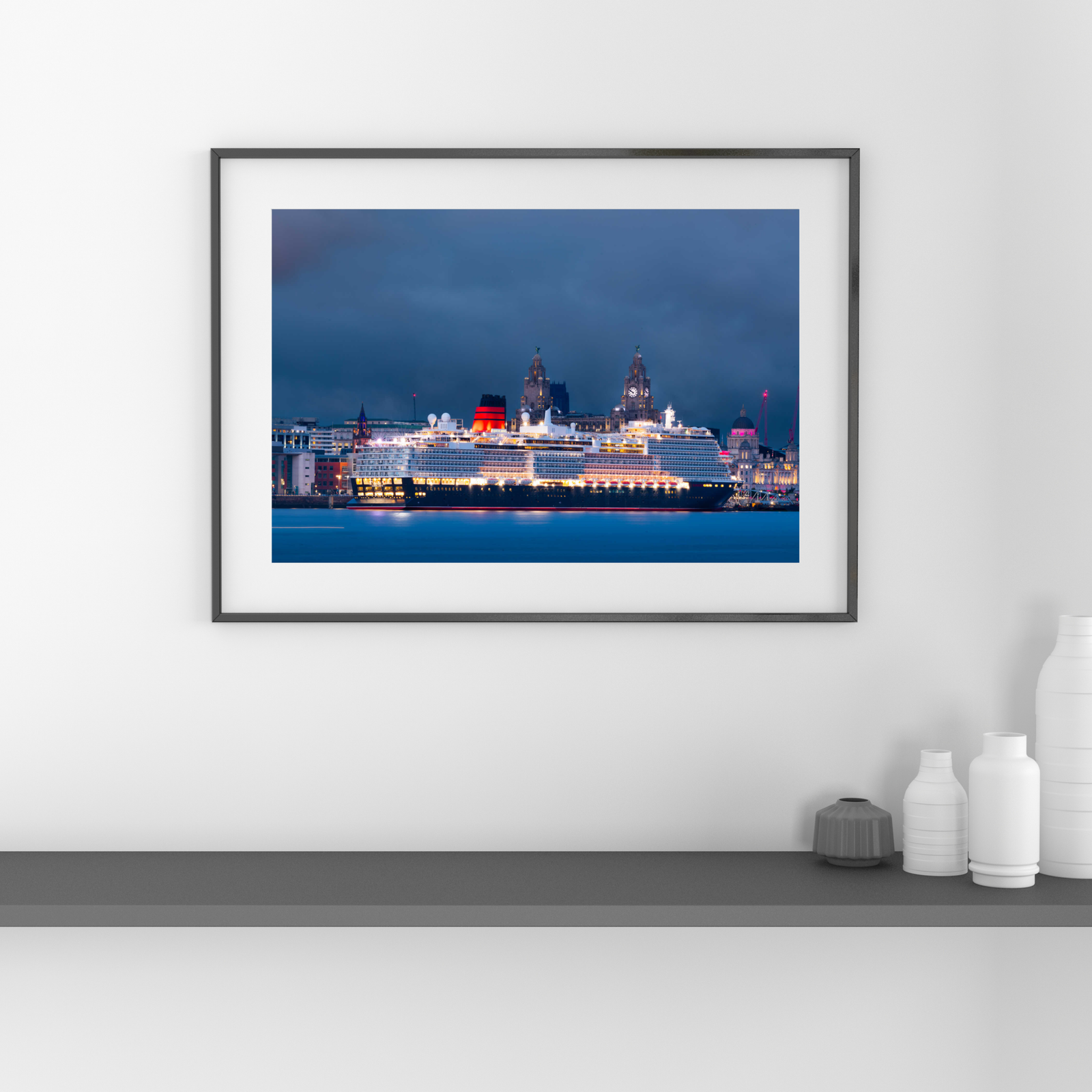 queen anne docked in liverpool with the stunning skyline
